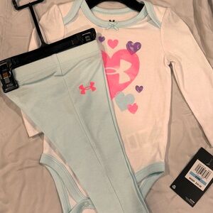 Under Armour size 6-9months. NWT